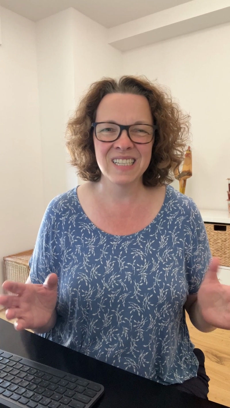 A video frame of Julie grimacing, which Claude proposed as a smiling thumbnail.